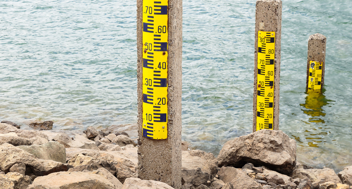 Pillars in a body of water measuring water levels