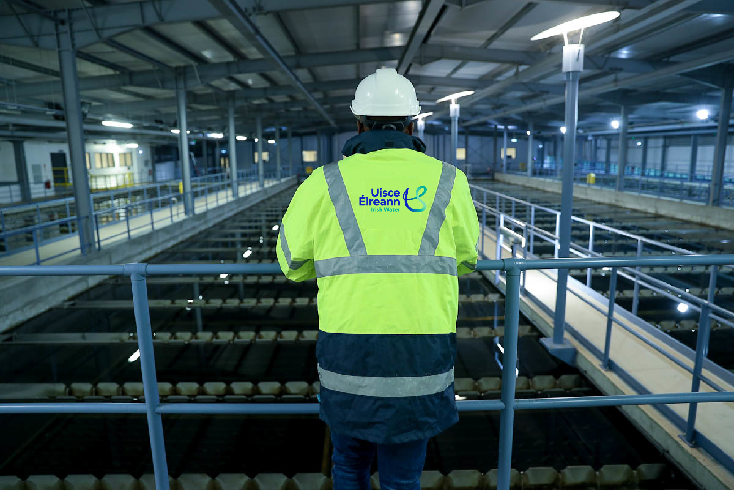 An Uisce Éireann worker standing in a water treatment plant