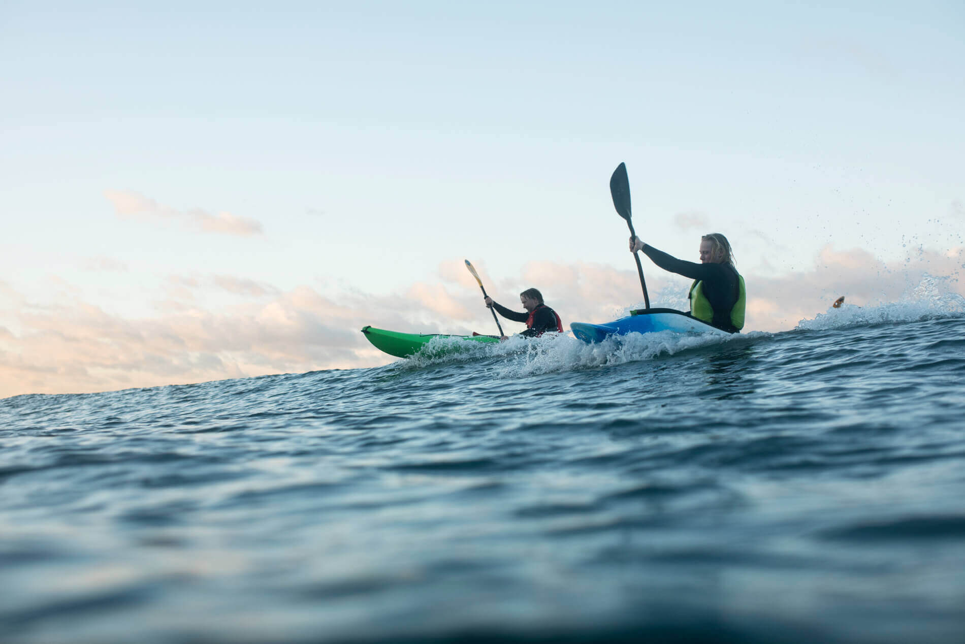 A man and a woman kayaking