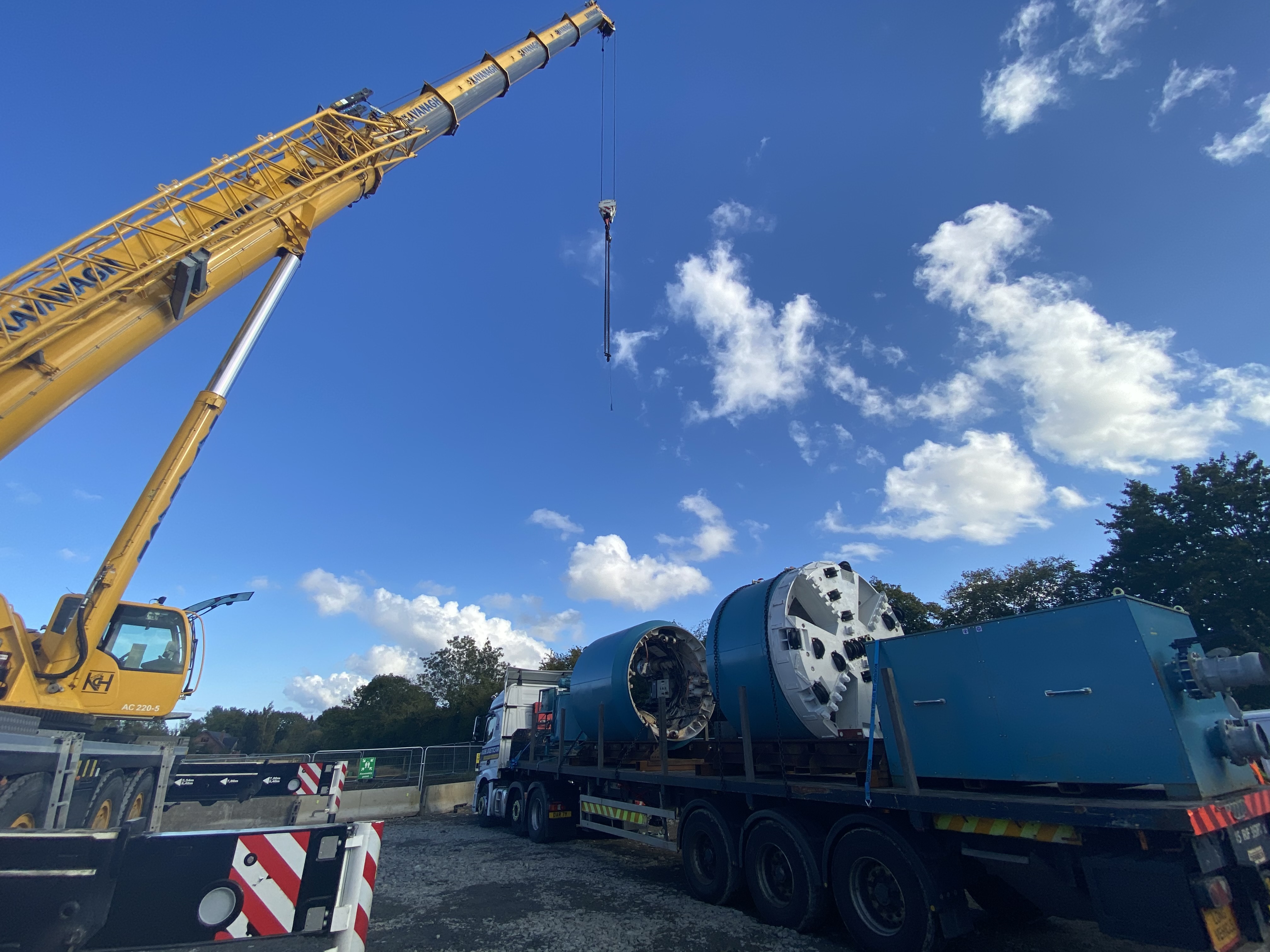 A truck and a crane on a construction site