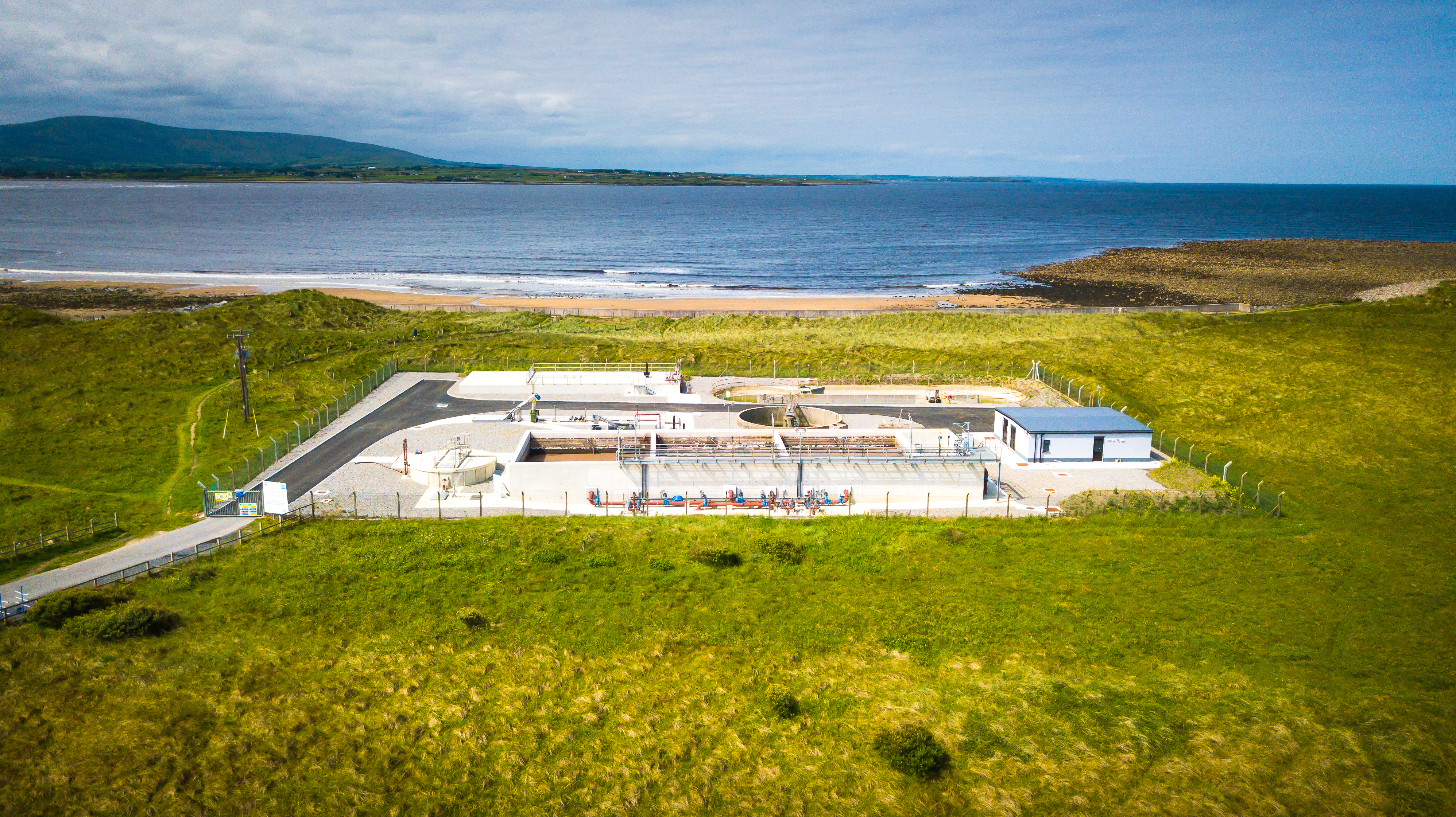 A water treatment facility next to a beach