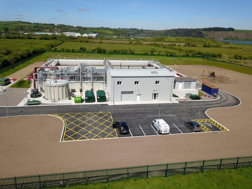 A water treatment plant with a small car park