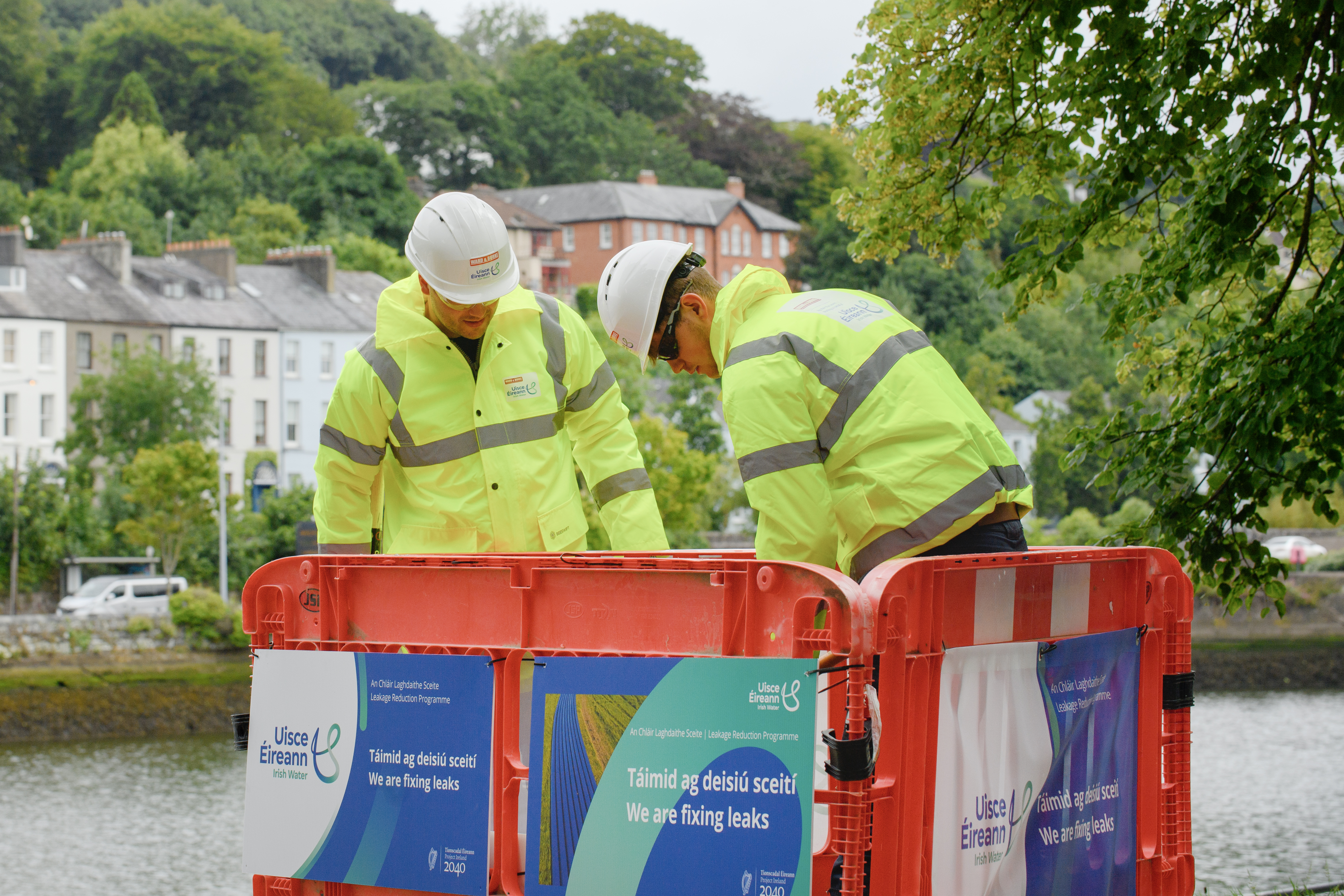 uisce eireann workers building something above a road