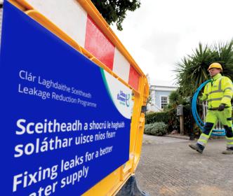 LRP Signage worker with blue pipes